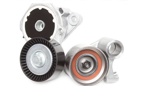 A close up of a belt tensioner on a white background.