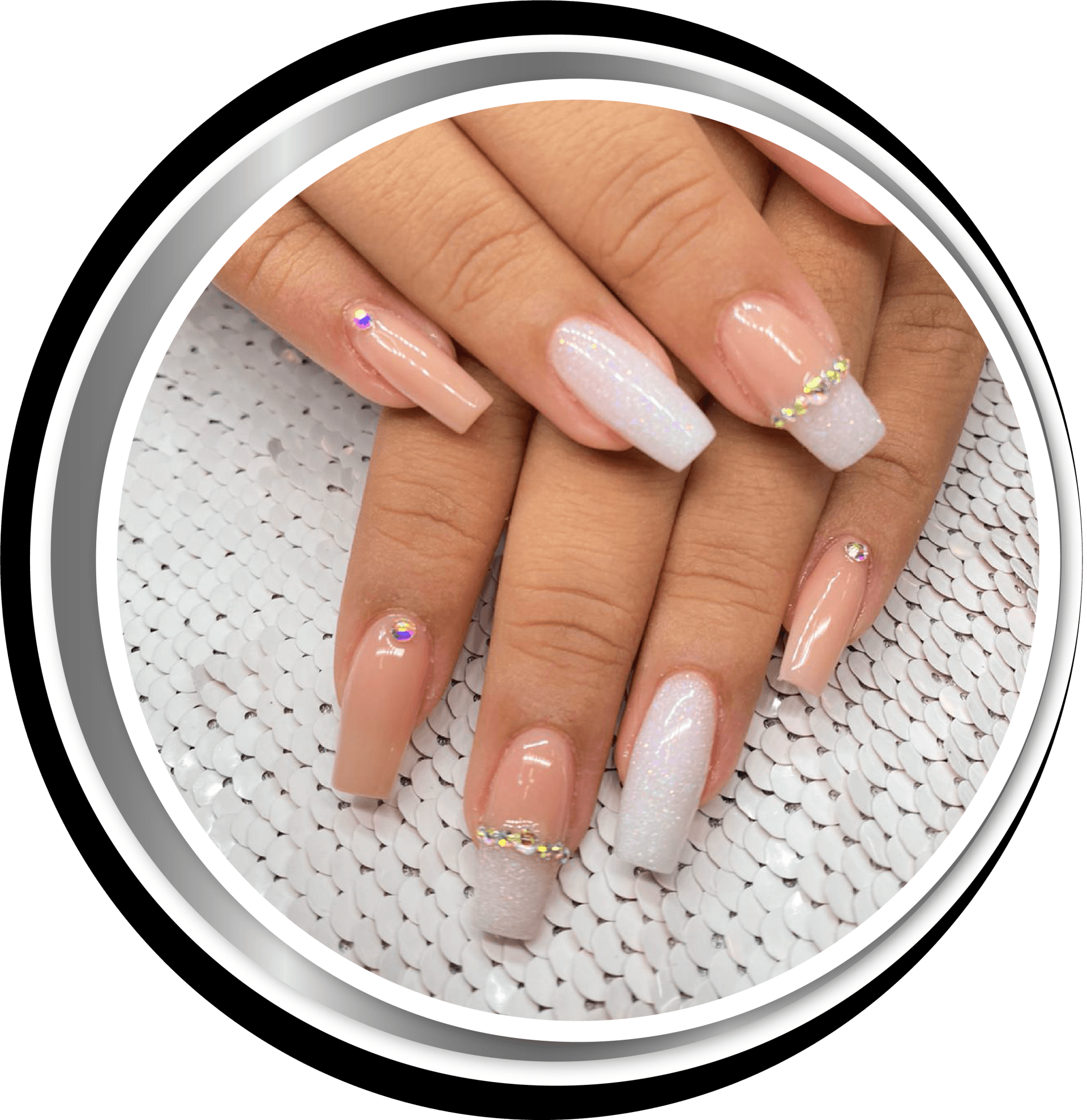 A close up of a woman 's nails with rhinestones on them