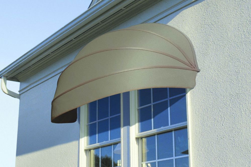 A House With a Window With a Canopy Over It — Whitsunday Vogue Interiors in Proserpine, QLD
