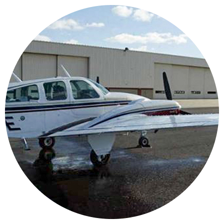 A small plane with the letters niye on the side of it