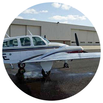 A small plane with the letters niye on the side of it