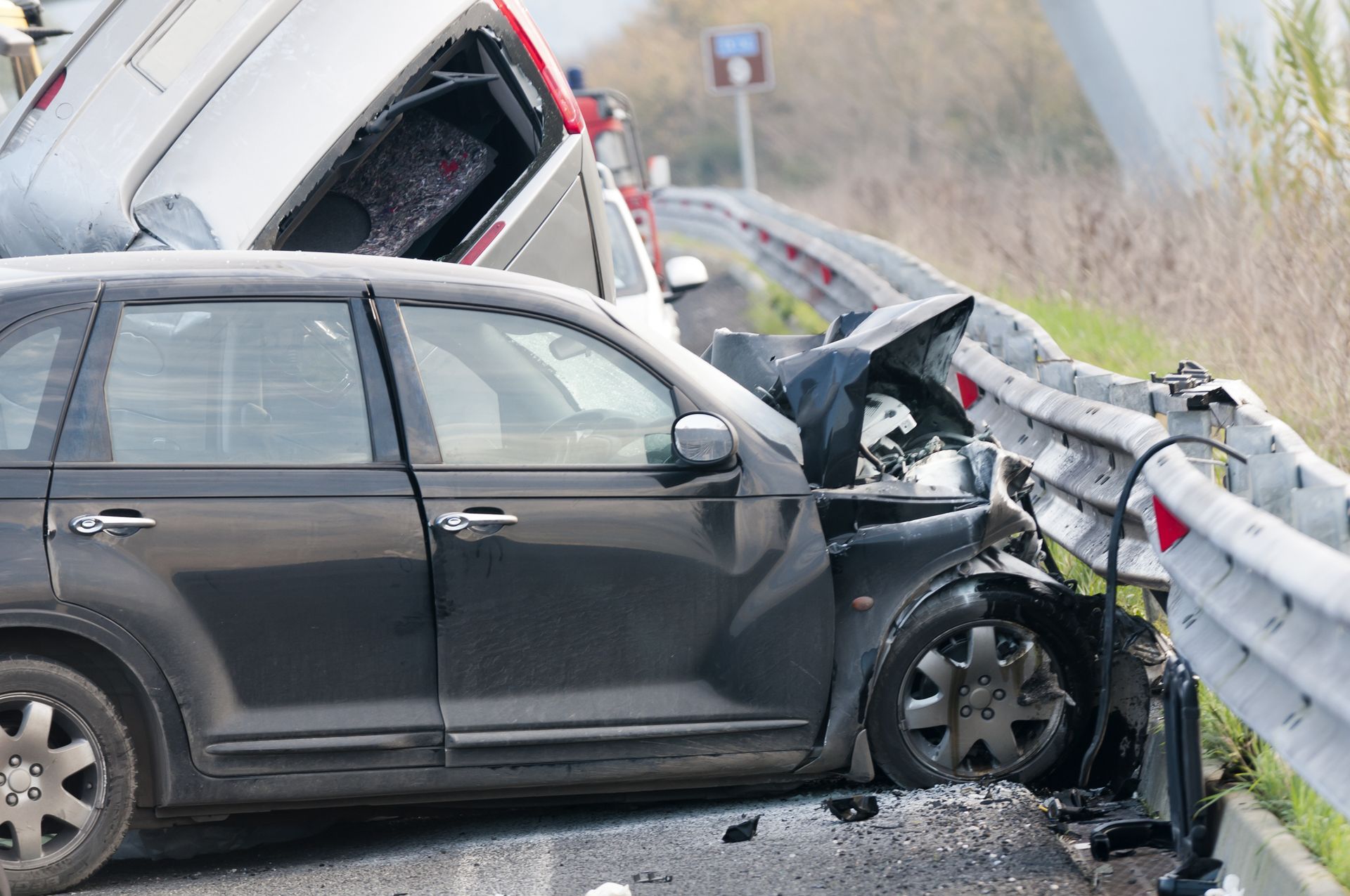 Men And Women Checking Car Scratch — Kingsport TN — William A. Law Attorney at Law