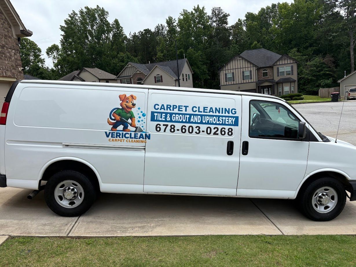 “VeriClean Carpet Cleaning service van parked outside a home, ready for a carpet cleaning