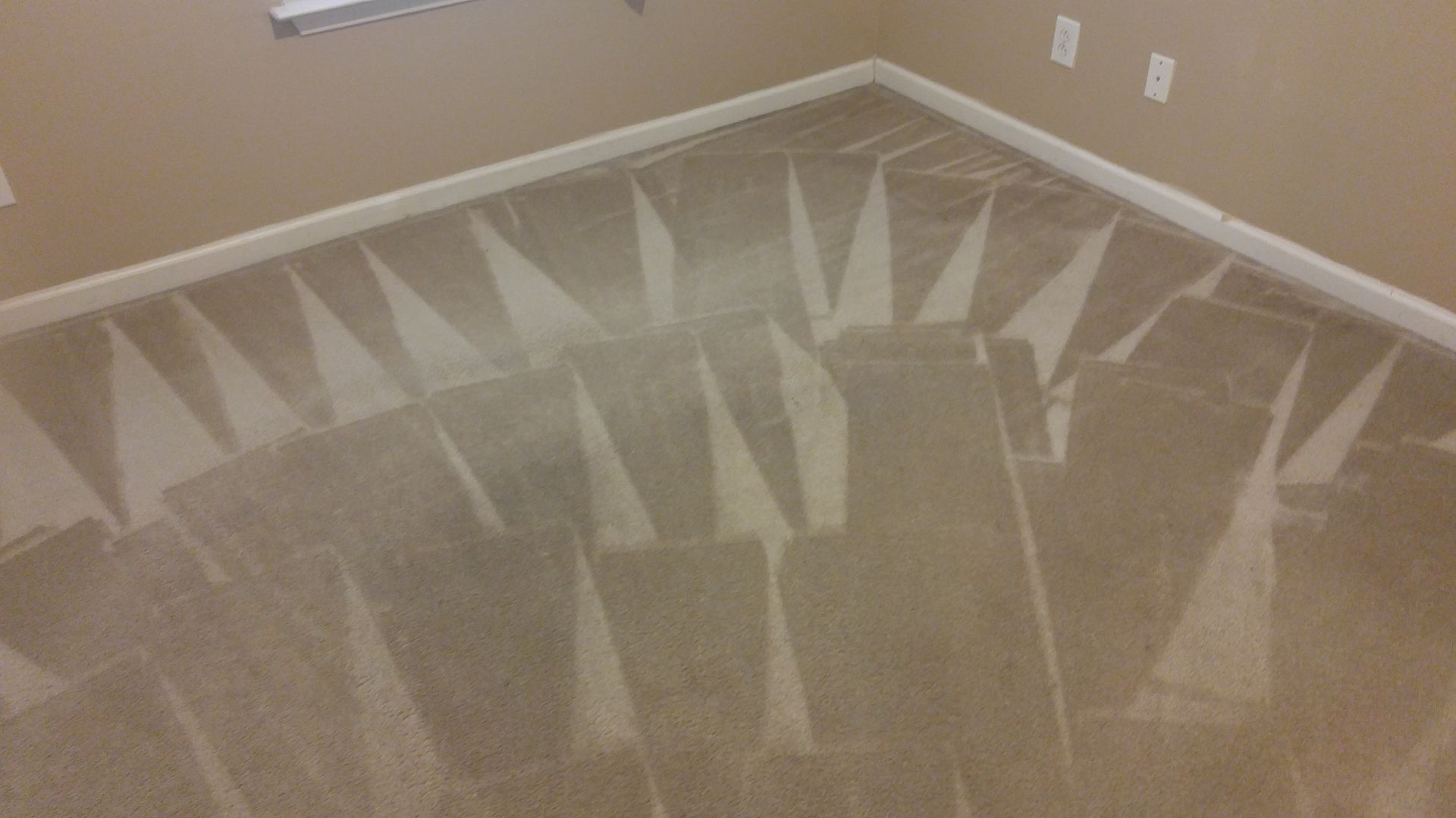 “VeriClean Carpet Cleaning delivering expert steam cleaning in an Acworth GA home bedroom.”