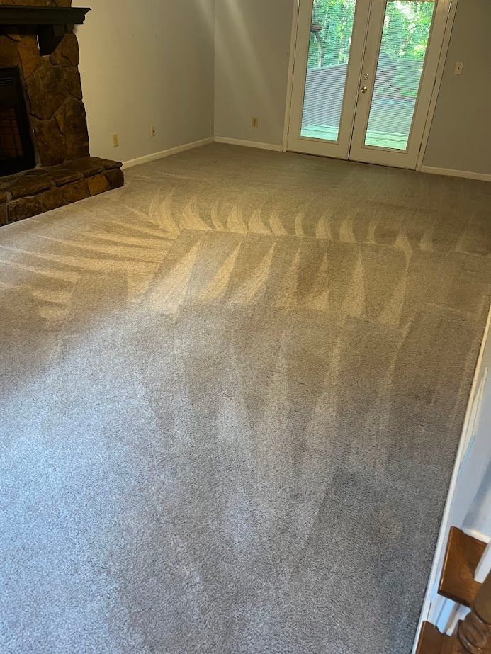 living room carpet professionally cleaned by VeriClean Carpet Cleaning in Acworth Ga, featuring deep steam cleaning