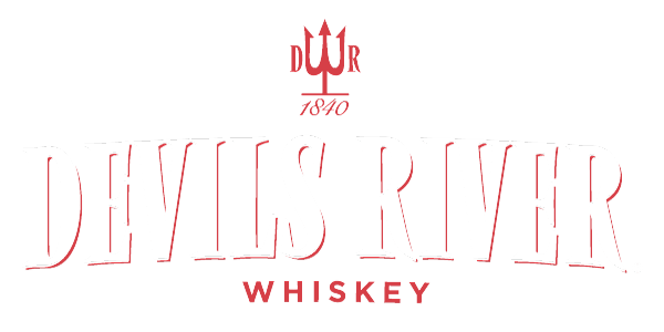 Devils River Whiskey logo in red with a trident and the text 