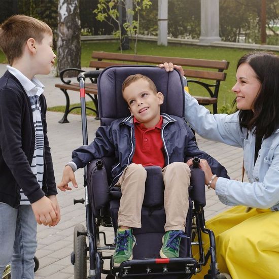Cerebral Palsy families Boy with Cerebral Palsy and his family