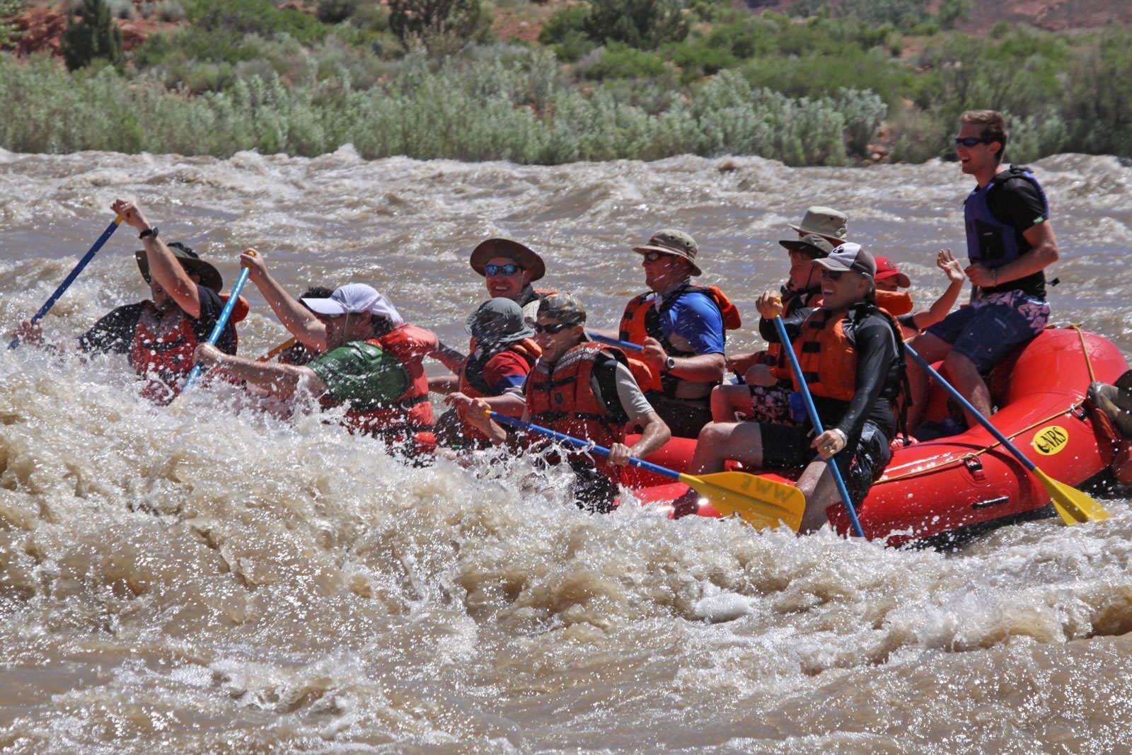 A group of people are rafting down a river.