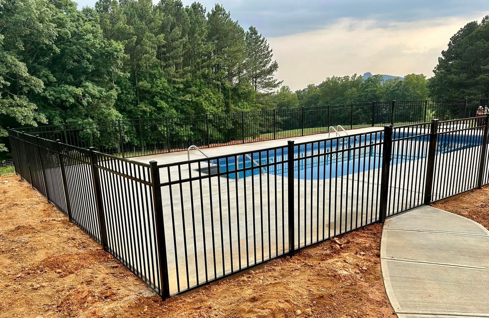 Aluminum fencing around swimming pool
