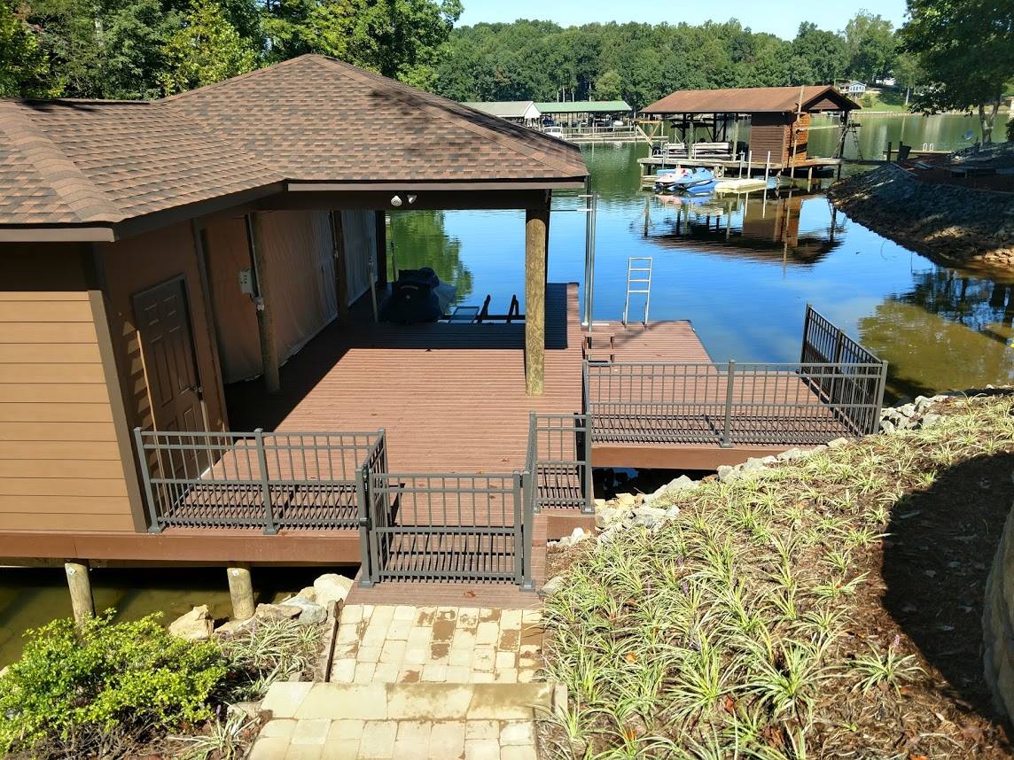 Aluminum fencing around boat dock