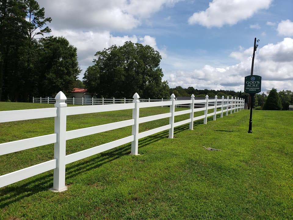 white vinyl picket fence