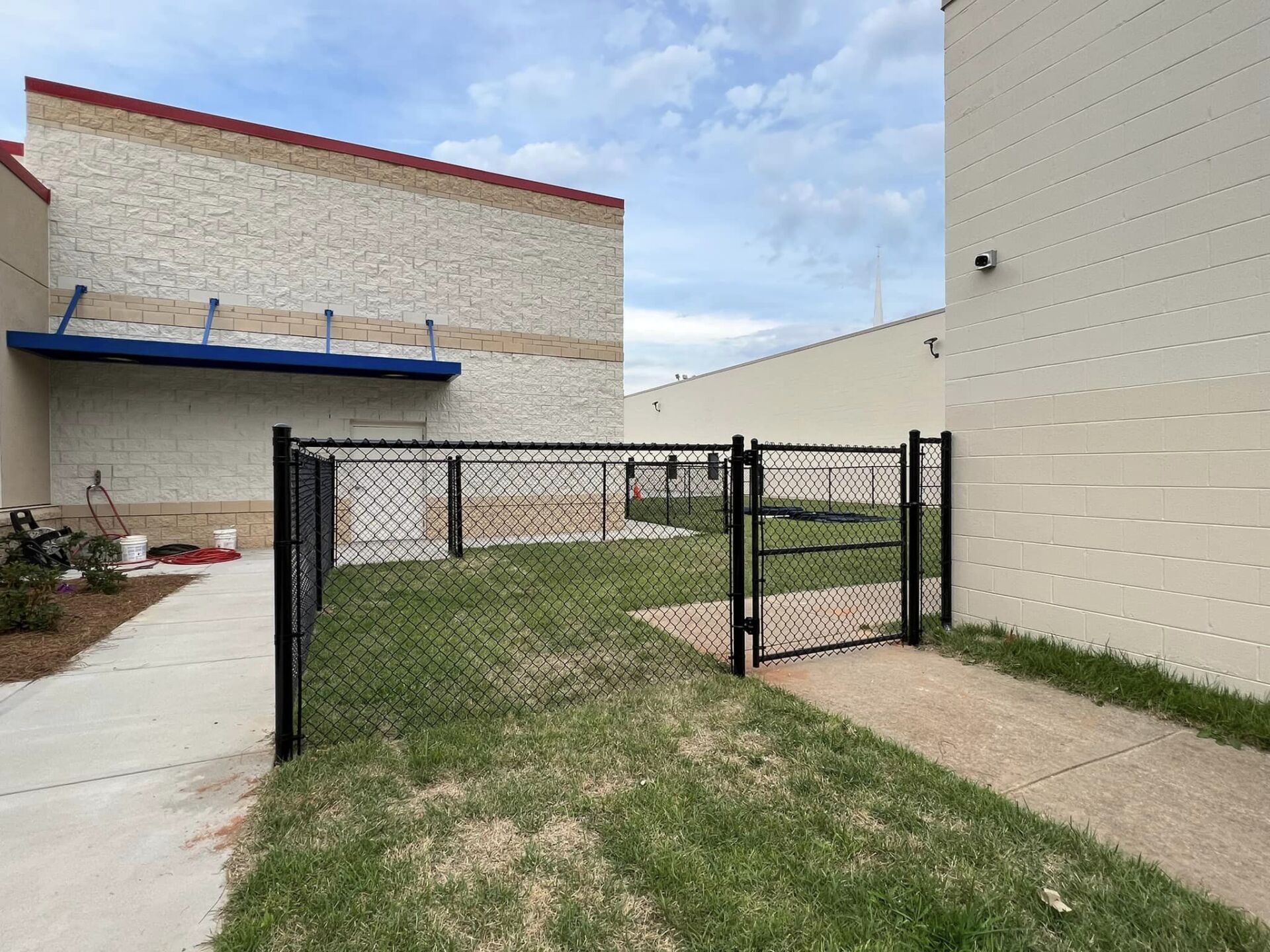 Black vinyl-coated chain link fencing