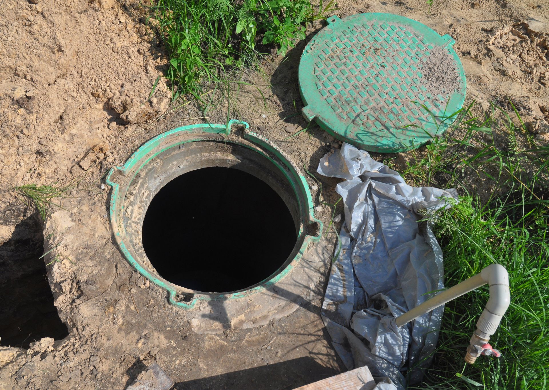 Manhole Opened — Ray Township, MI — Allemon Septic Service Inc. Manhole Opened — Ray Township, MI — Allemon Septic Service Inc.