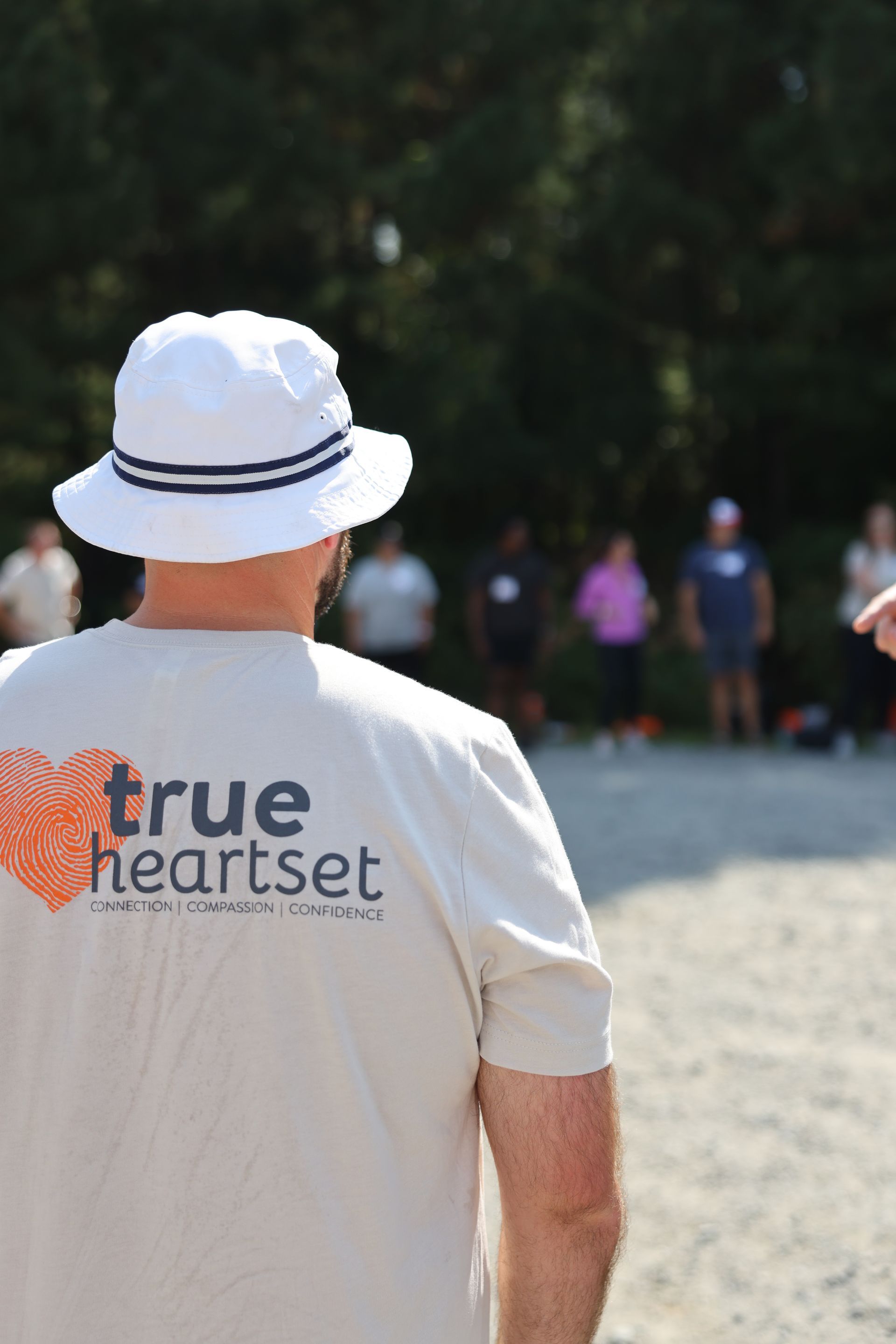 Man in white hat and t-shirt with 