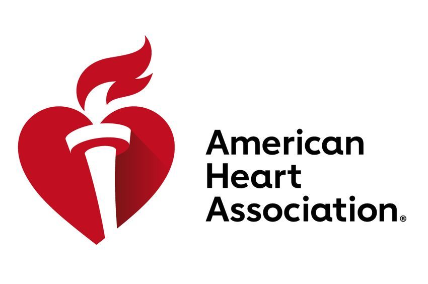 The american heart association logo is a red heart with a torch on it.