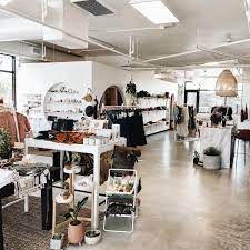 A store filled with lots of furniture and plants.