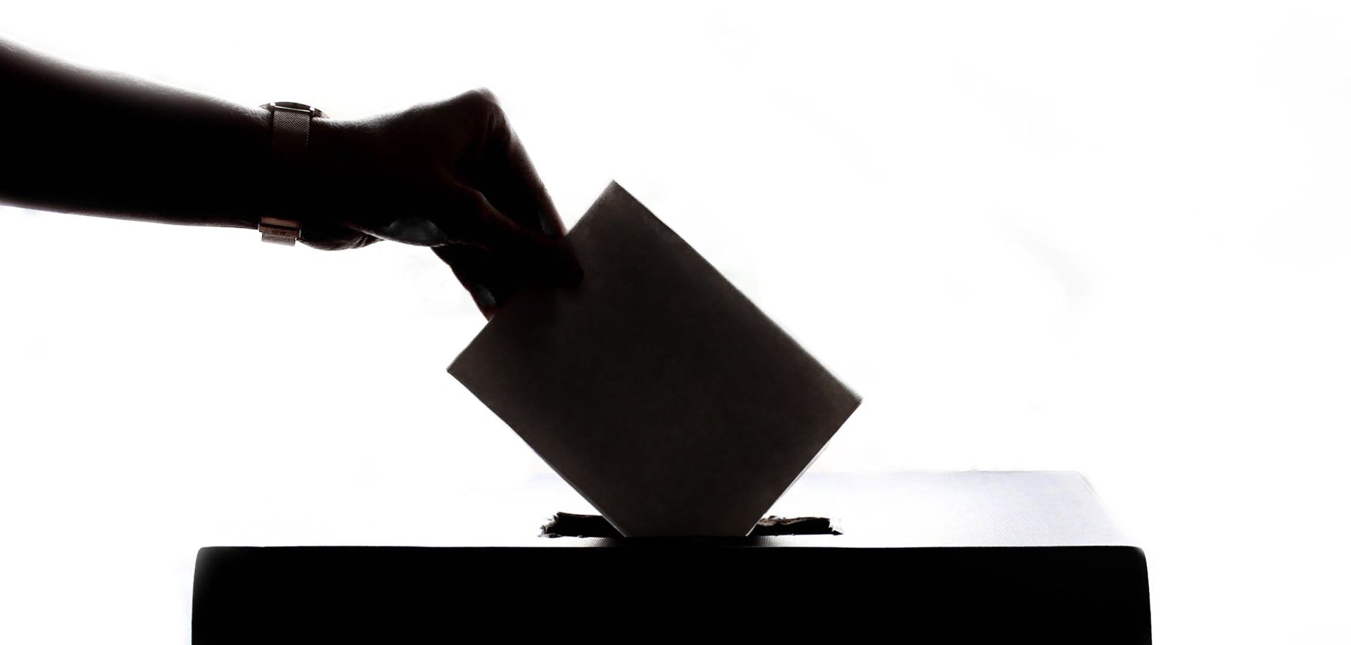a person voting to illustrate resident engagement- Empower HOA Web and Software Solutions