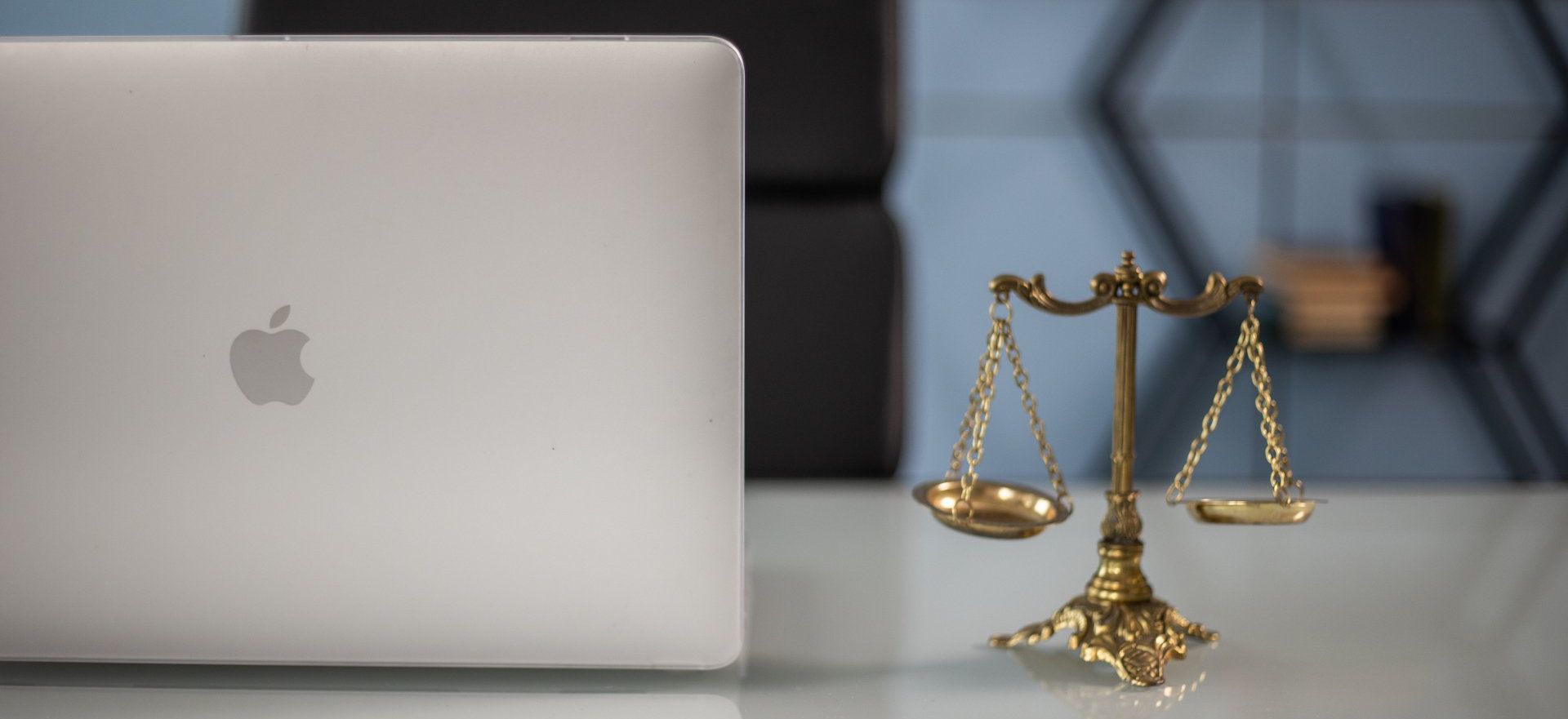 Scales of justice to illustrate compliance and security - Empower HOA Web and Software Solutions