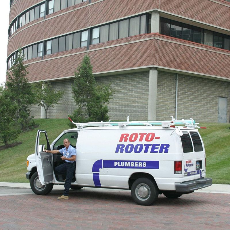 White Roto-Rooter Van Parked in Front of a Building - Apple Valley, CA - Roto-Rooter Plumbers and Septic Service