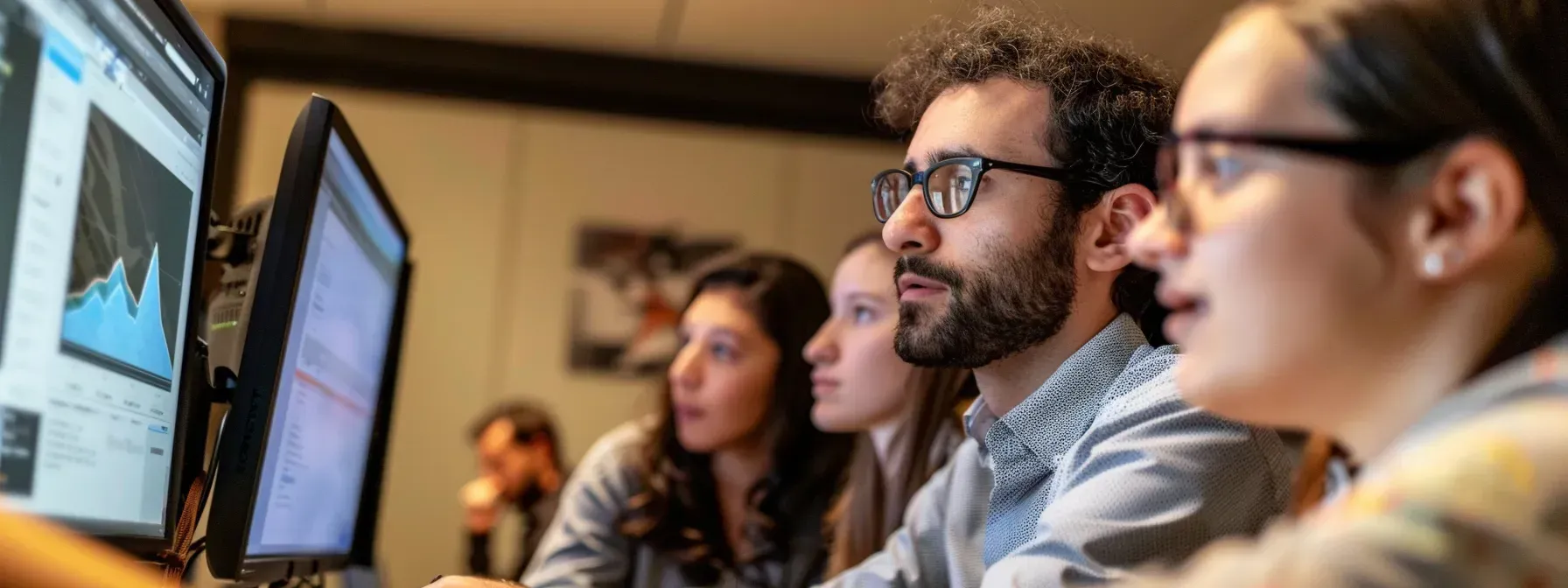 Group of people looking at SEO analytics- Forever Young Digital