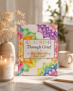 Coloring Through Grief hardcover book with floral cover art
