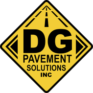 A yellow sign that says dg pavement solutions inc