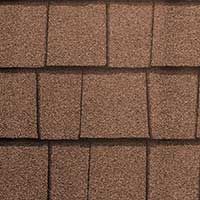 A close up of a brown shingle roof.