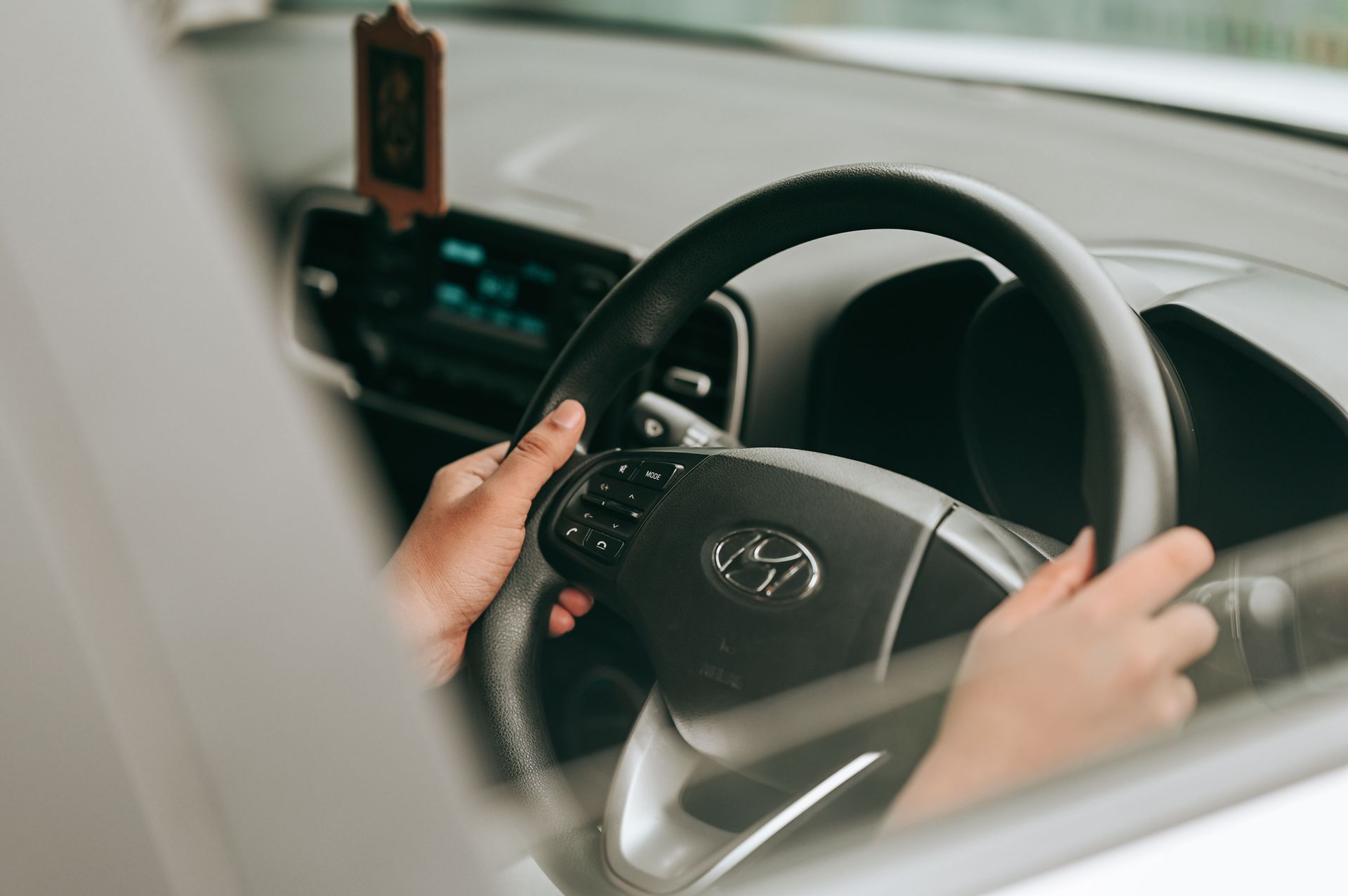 Motorist Gripping Steering Wheel