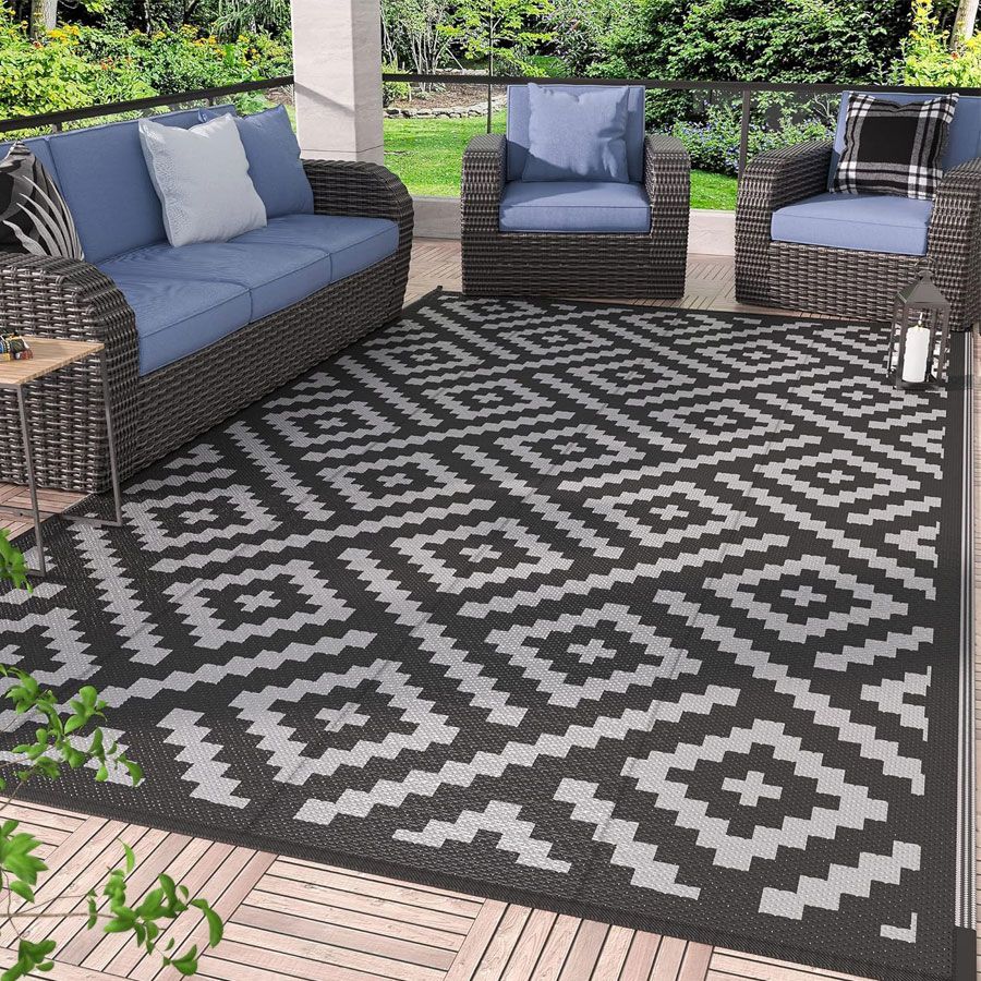 reversible outdoor carpet mat perfect for campsite and campground and essential to new rv trailer camping