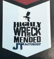 Black-and-white logo reading &ldquo;Hugly Wreck Mended and Nobody&rdquo; with a small silhouette above.