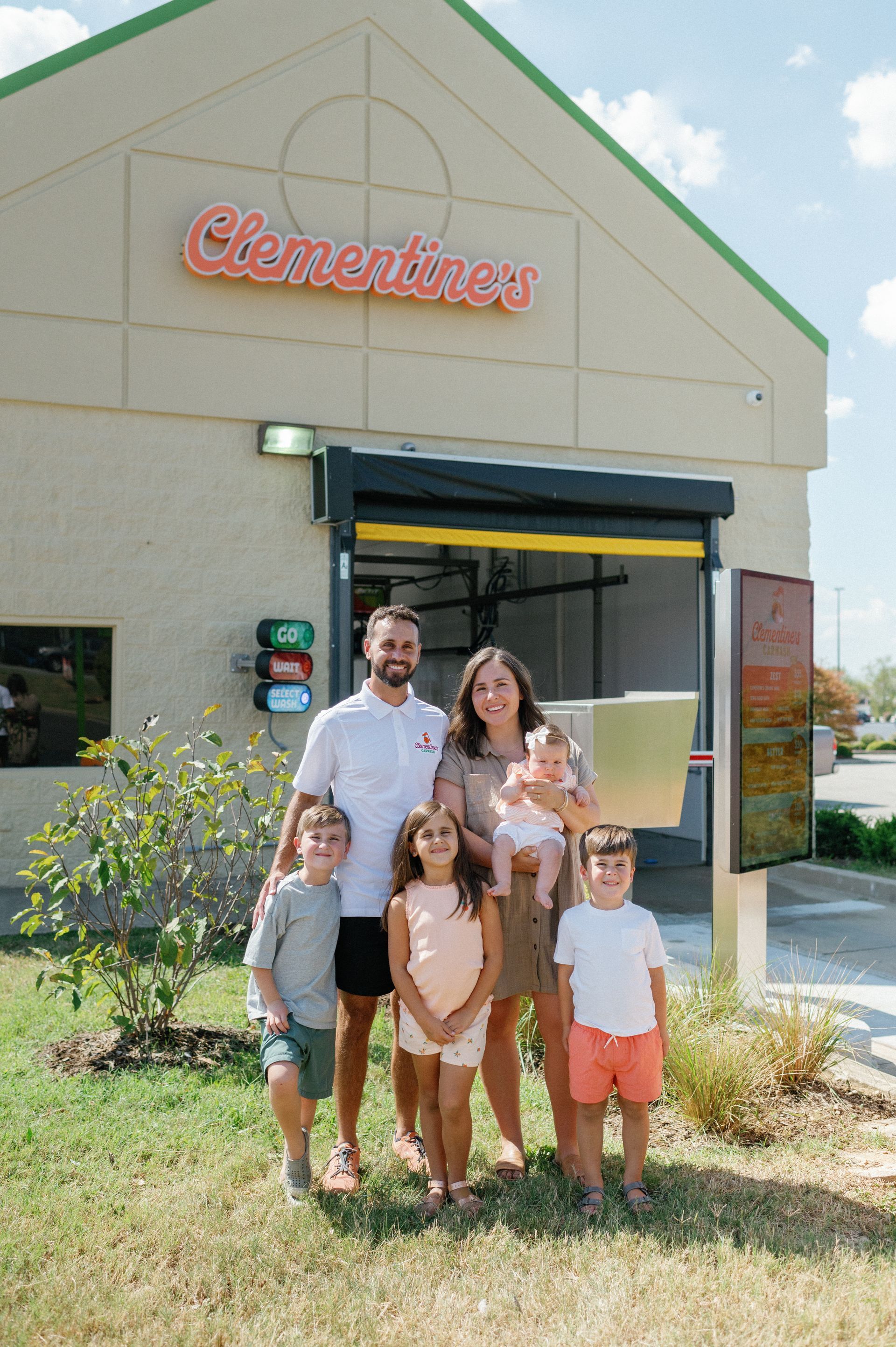 Alex Thomas with family at Clementine's Car Wash in La Grange Kentucky