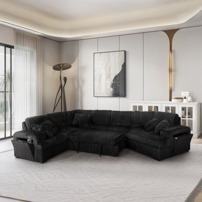 Black sectional sofa in a modern living room.