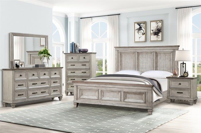 A rustic-style bedroom set in weathered light gray wood, including a bed, dresser with mirror, chest, and nightstand.