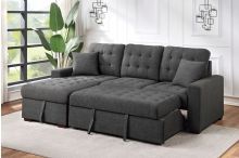 Gray sectional sofa with a chaise and pull-out bed in a bright room.