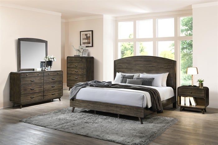 A modern rustic bedroom set in dark wood, featuring a bed, dresser with mirror, chest of drawers, and a nightstand.