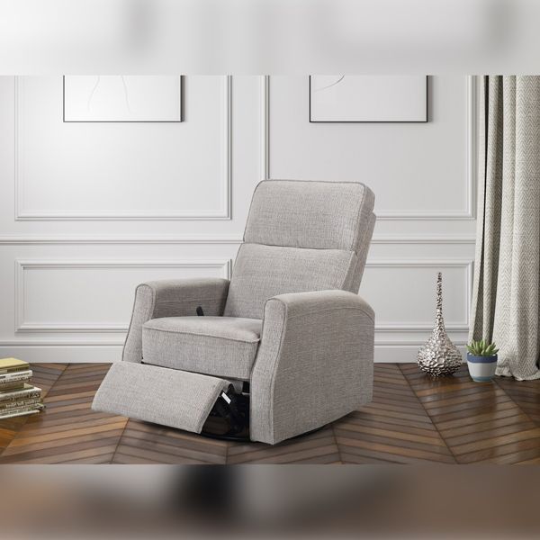 Light gray recliner chair in a living room, footrest extended, near a curtain.