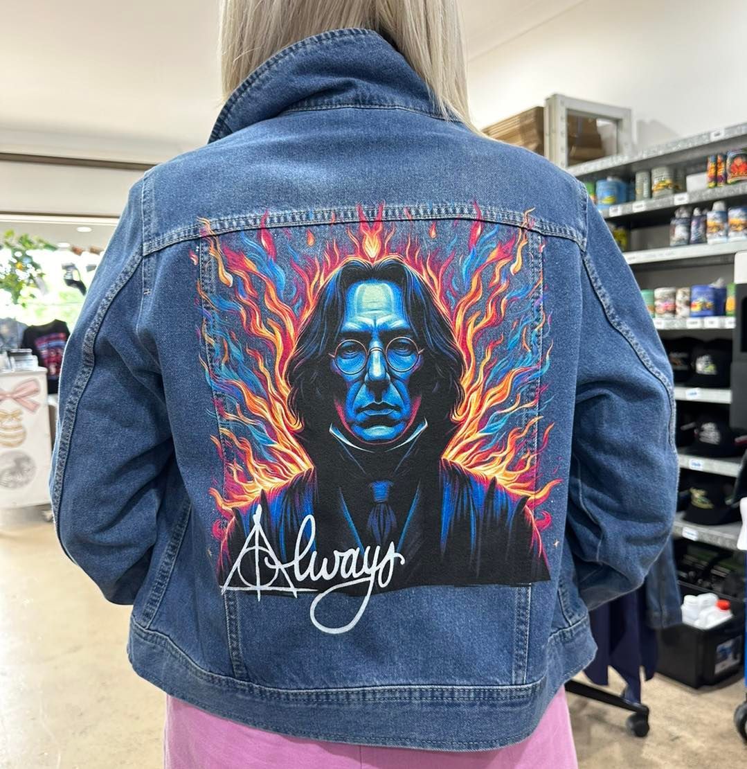 Person Wearing Denim Jacket With Snape Artwork on Back — That Printed Vinyl Place in Heatley, QLD