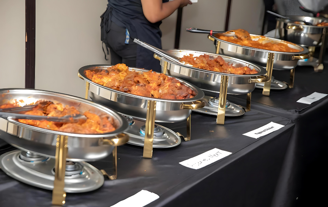 A buffet table with a variety of food on it