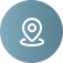 Blue circle icon with a white location pin and person silhouette inside
