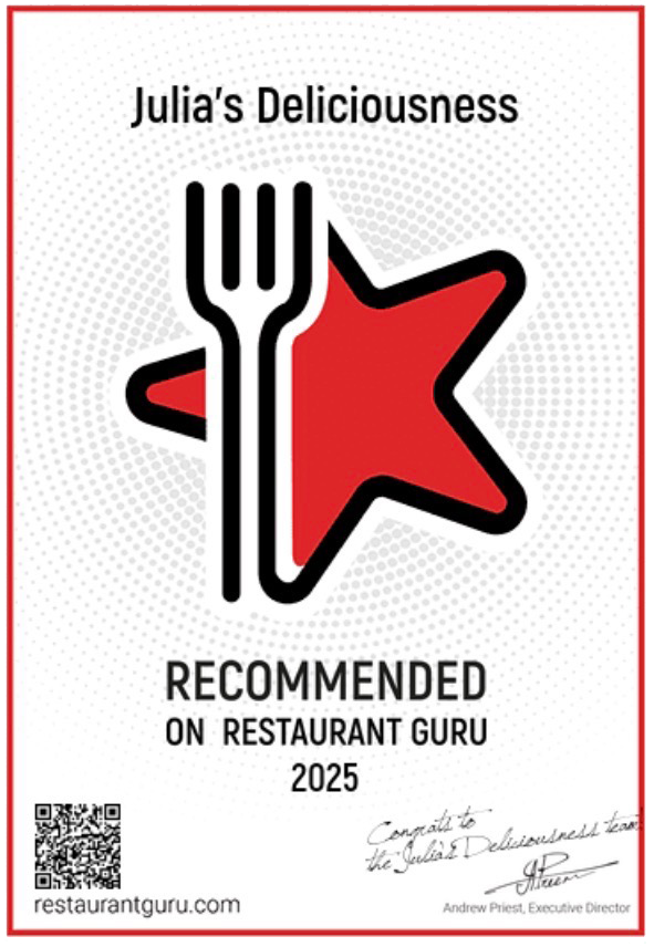 Julia’s Deliciousness Restaurant Guru recommended badge with red star and fork icon