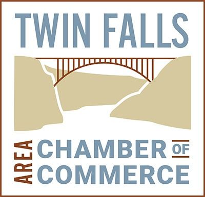 Twin Falls Area Chamber of Commerce logo with a tan bridge and blue text on white background