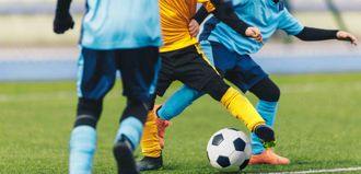 Kids playing soccer