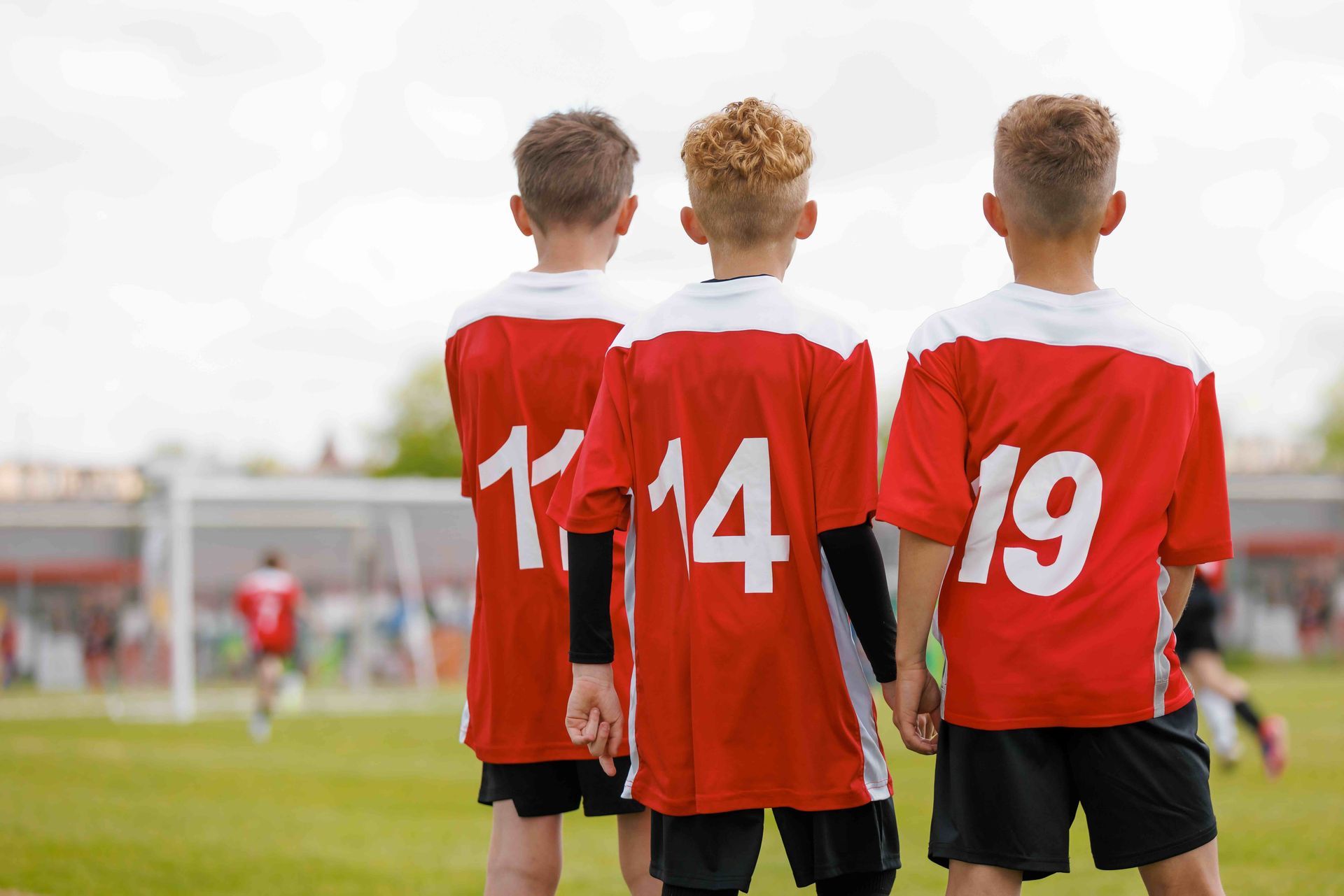soccer team looking at a field