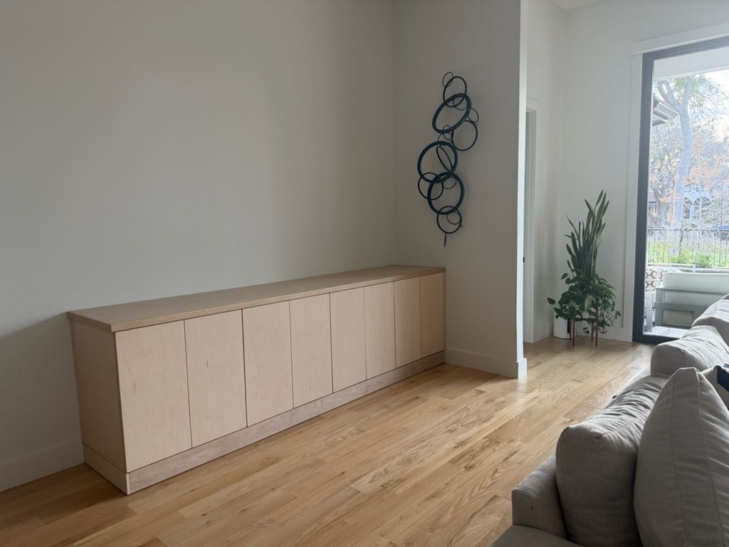 Unfinished custom built-in cabinets installation in North Texas home by MSM Cabinets