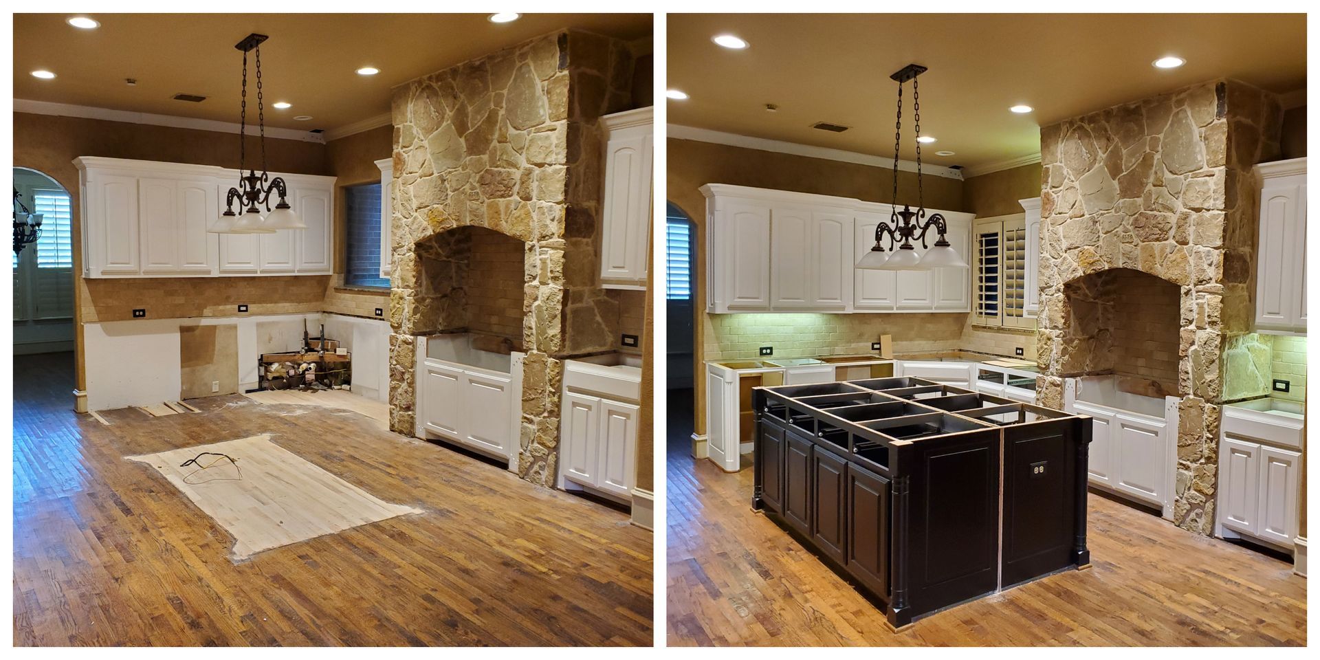 Kitchen renovation with dark island, white cabinets, and stone archway.
