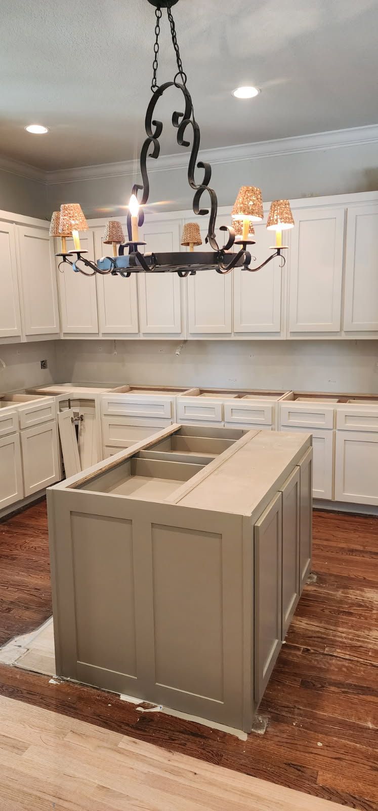 Custom kitchen island and cabinetry layout in North Texas home remodel