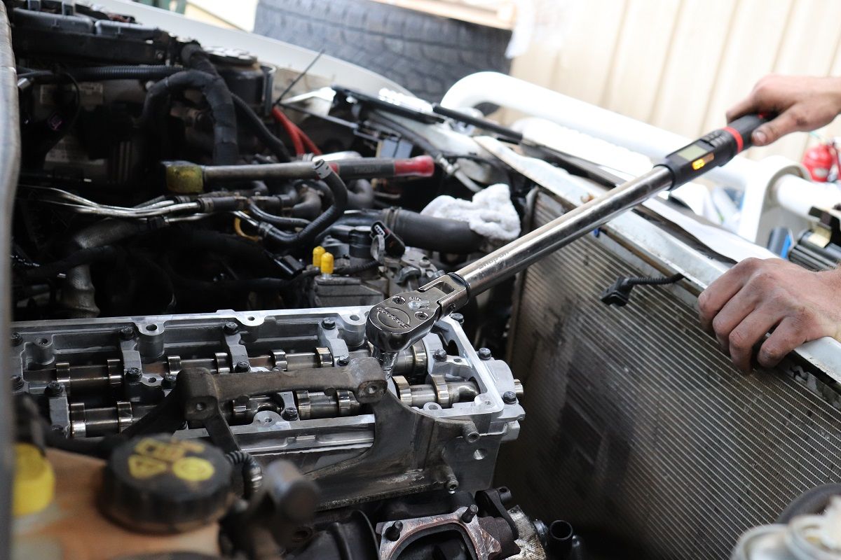Mechanic Using Torque Wrench On Engine Components — Ballina Car Centre in Ballina, NSW