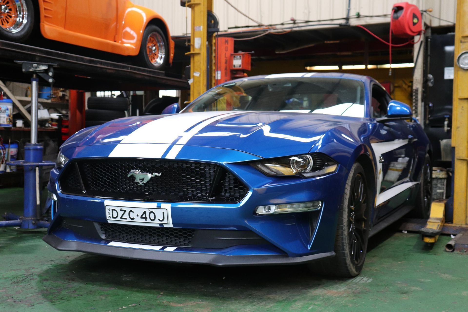 Blue Ford Mustang With White Racing Stripes — Ballina Car Centre in Ballina, NSW