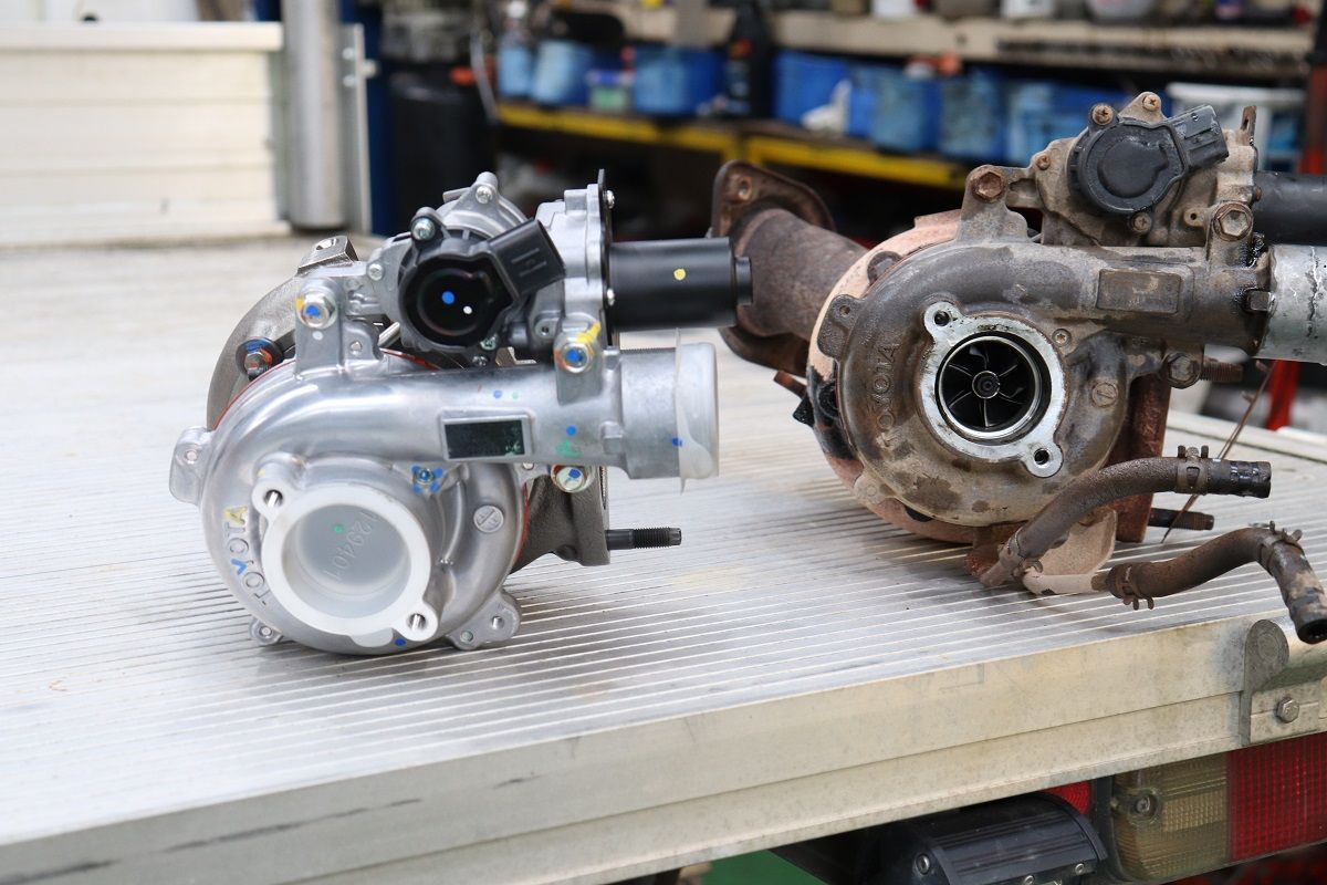 Two Turbochargers Side-By-Side On Metal Surface — Ballina Car Centre in Ballina, NSW