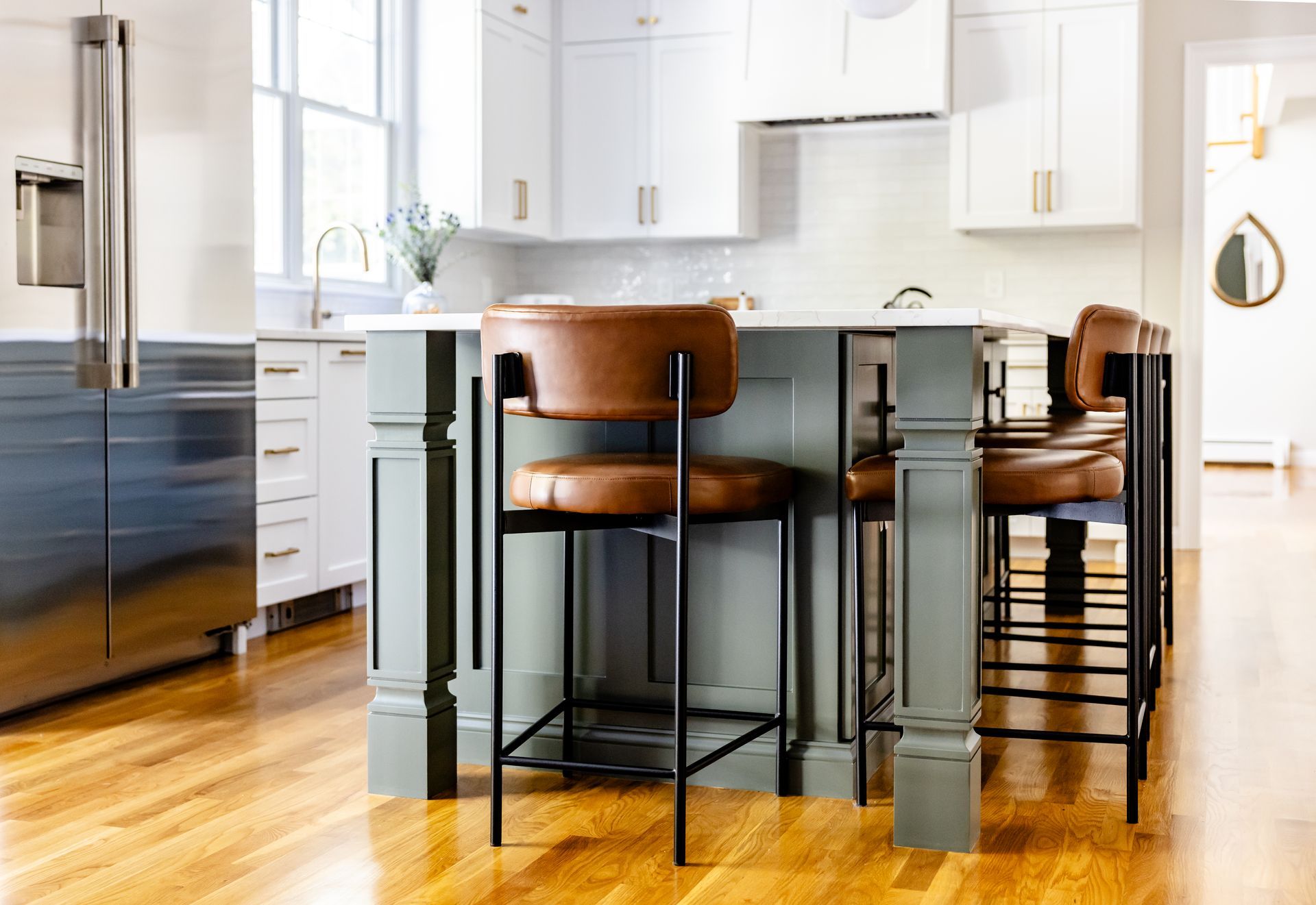 Leather counter stools at the green island